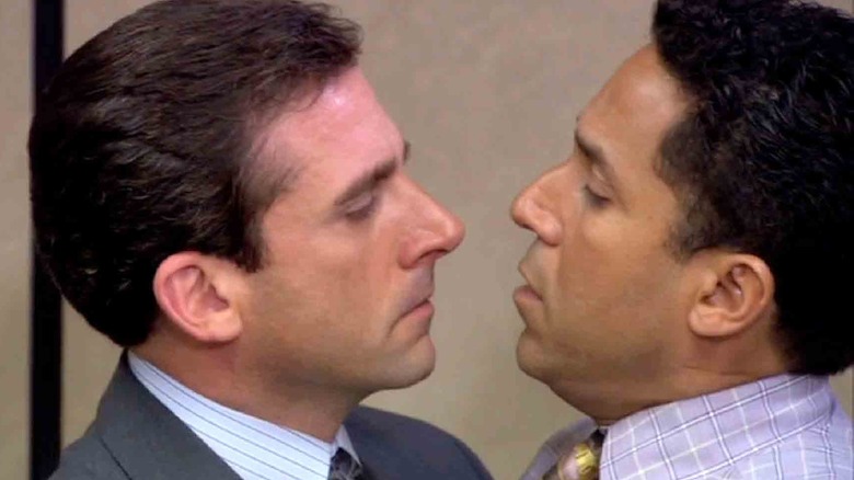 Michael Scott kissing Oscar Martinez on The Office