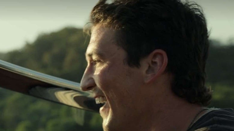 Miles Teller laughs