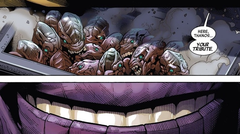 Smiling Thanos receiving dead aliens