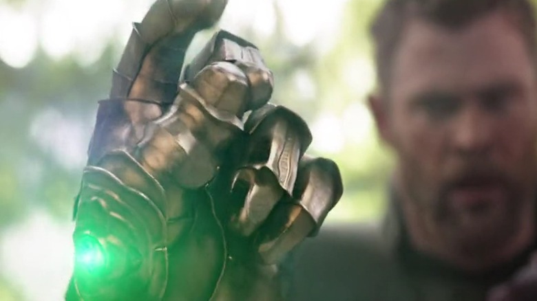 Thanos' hand about to snap