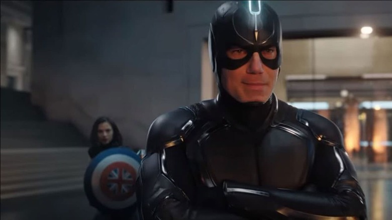 Black Bolt smiles flanked by Captain Britain