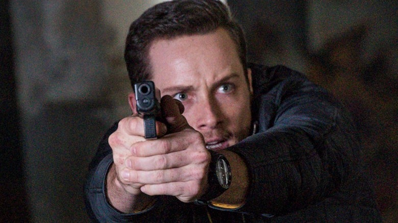 Jay Halstead pointing gun