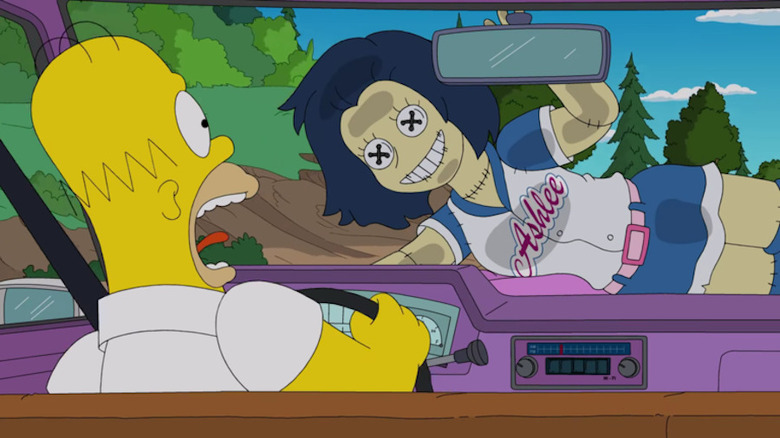 Homer is shocked by an Ashlee doll