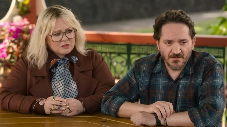Melissa McCarthy and Ben Falcone sitting down