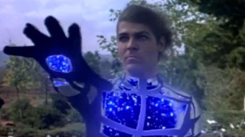 Automan holds out his hand