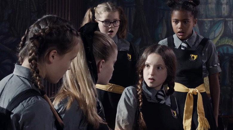 Young witches confront Mildred