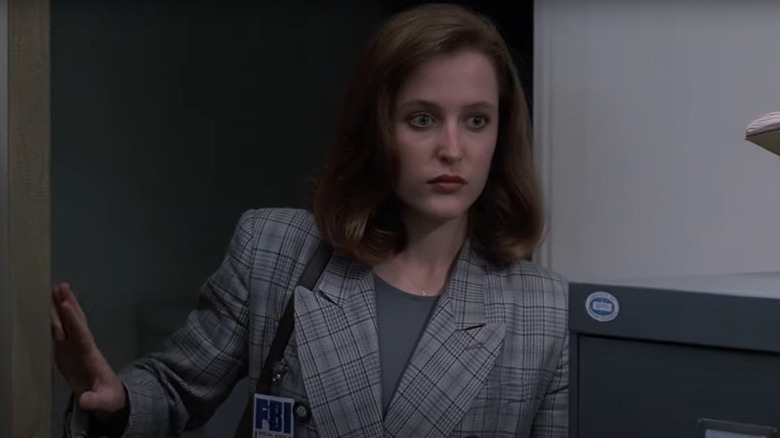 Scully arrives at the X-Files