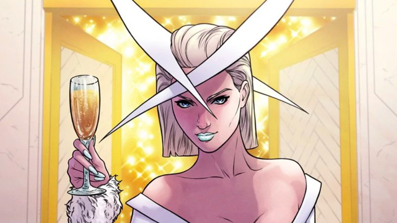 Emma Frost toasts with champagne