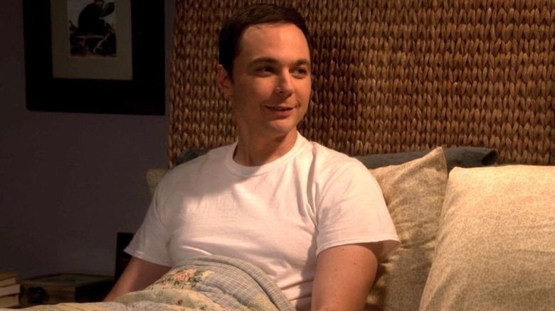 Sheldon Cooper smiling in bed