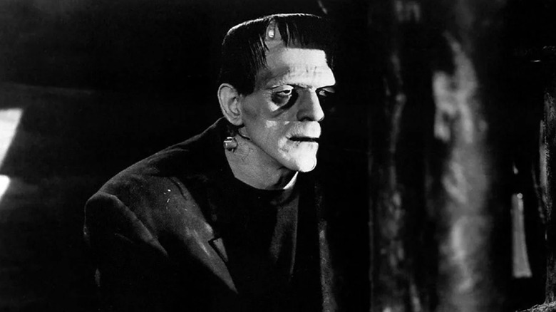 The creature emerges from the shadows in "Frankenstein" (1931)