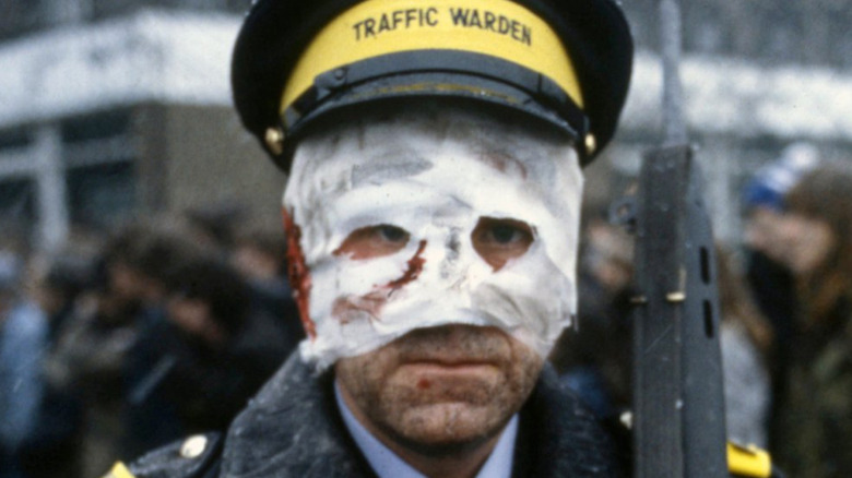 A traffic officer hides his radiation-scarred face in Threads