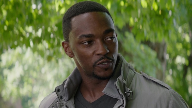 Sam Wilson talking outdoors