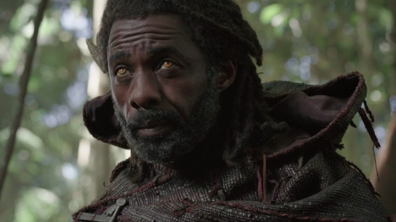 Heimdall wearing cloak in forest