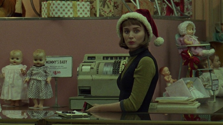 Rooney Mara behind counter