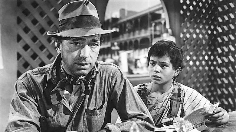 Humphrey Bogart has a drink in The Treasure of the Sierra Madre