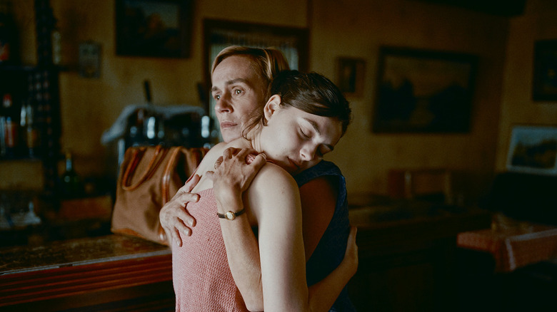 Anamaria Vartolomei embraces her mother