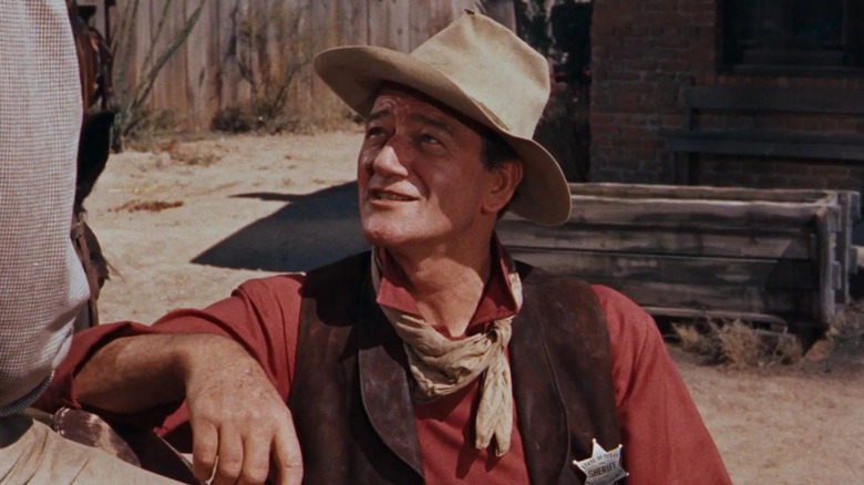 John Wayne leaning