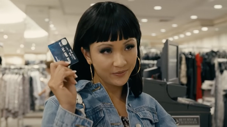 Constance Wu holding credit card