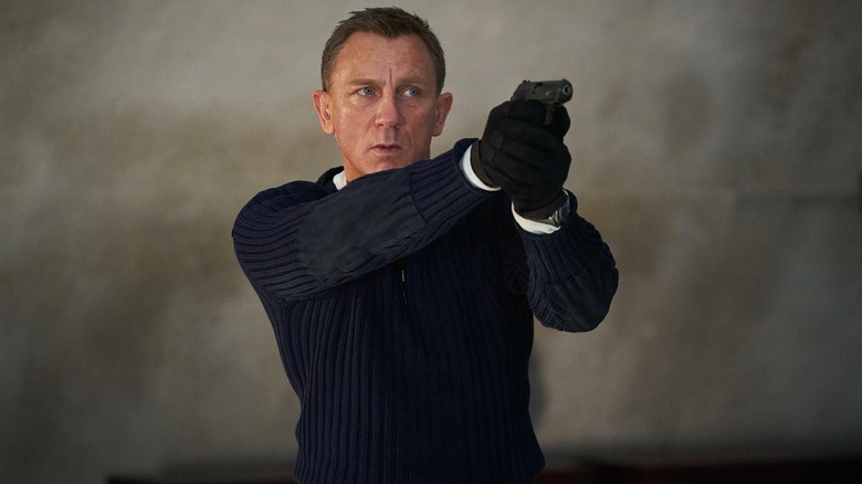 James Bond holding a gun