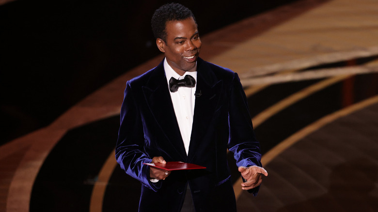 Chris Rock holding Oscars envelope