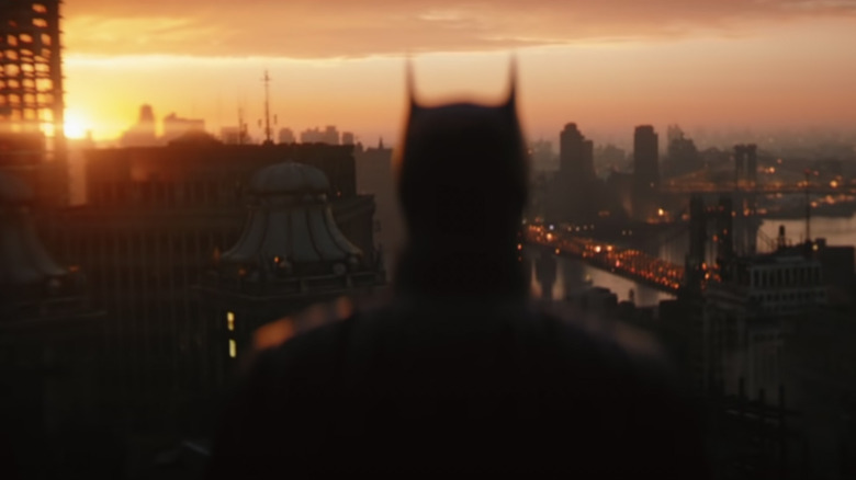 Batman looking out at Gotham City in "The Batman" 