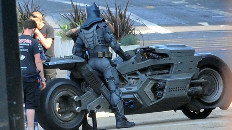 Batfleck boarding his motorcycle