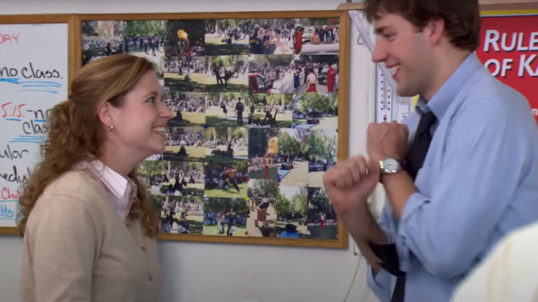 Jim and Pam talking excitedly