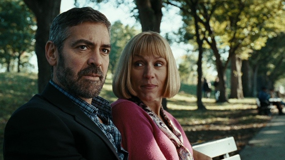 George Clooney sitting with Frances McDormand 