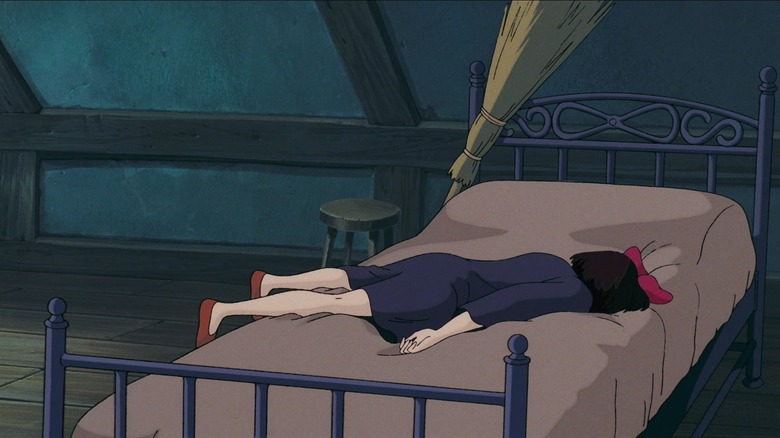 Kiki lying in a bed in "Kiki's Delivery Service"