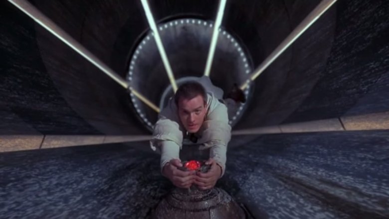 Ewan McGregor as Obi-wan Kenobi struggling to not fall down a bottomless shaft in the Phantom Menace