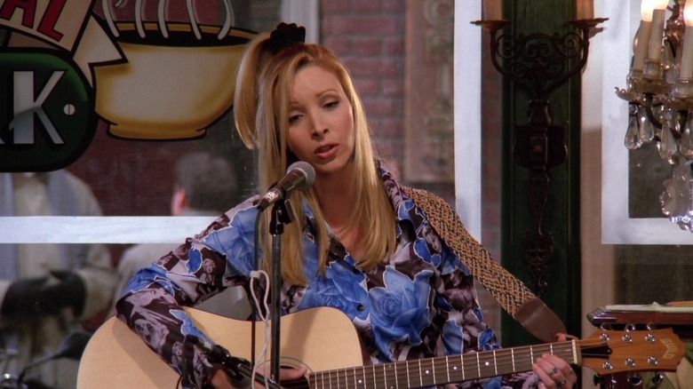 Phoebe playing guitar