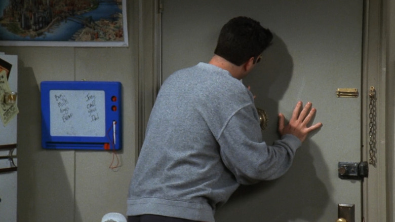 Ross looking in peep hole