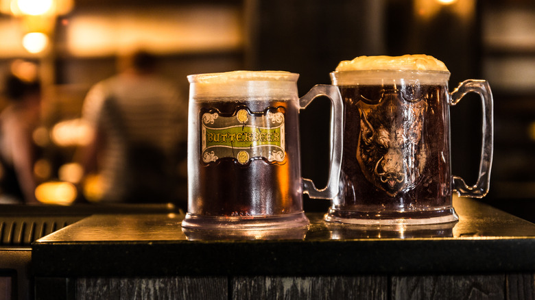 Two mugs of butterbeer