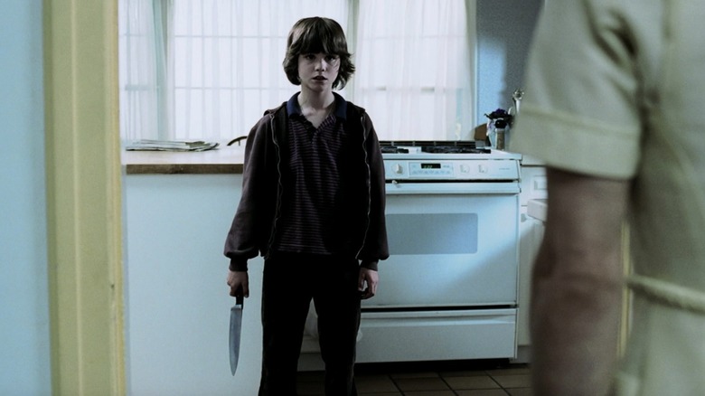 Andrea catches Evan with knife