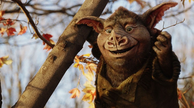 Hogsqueal smiles in a tree