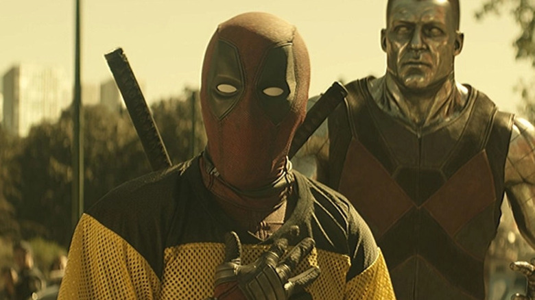Deadpool and Colossus stand together