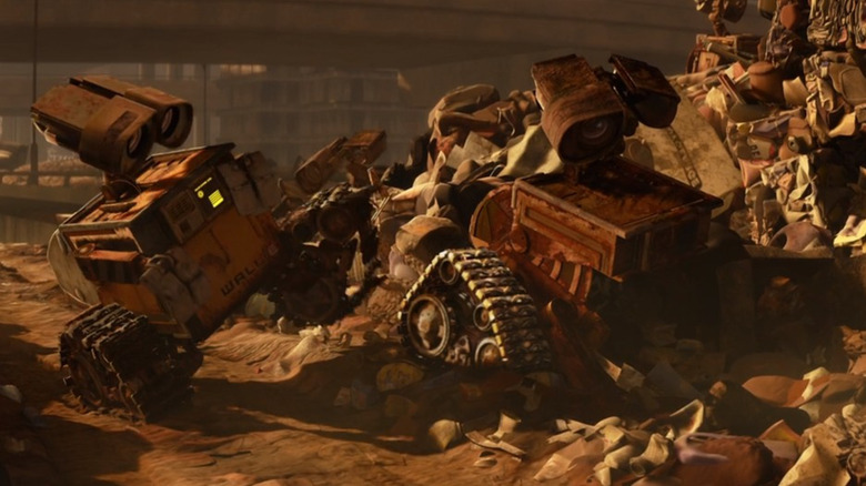 WALL-E compares his treads to those of a broken WALL-E