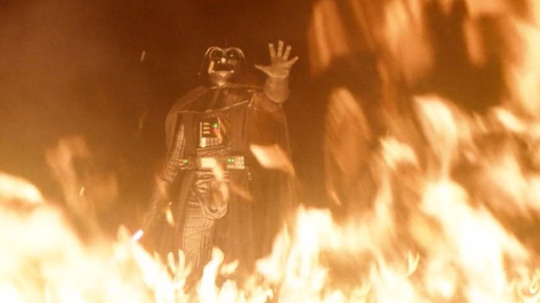 Vader drags Obi-Wan through flames