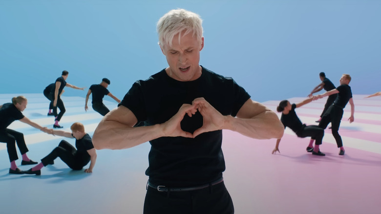 Ken makes heart gesture