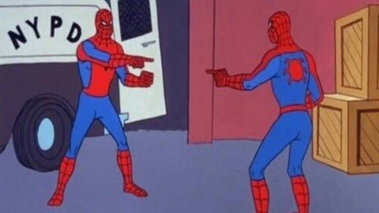 Two Spider-Men pointing at each other