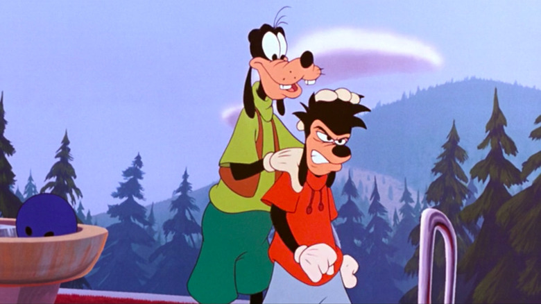 Goofy smiling while Max cringes