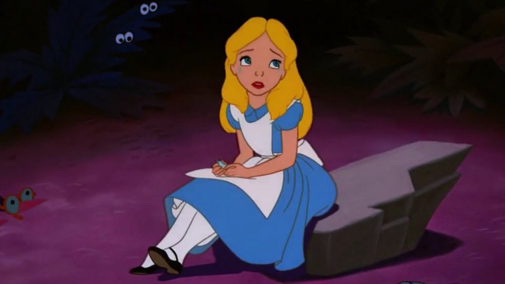 Alice crying alone during a moment of crisis, from Disney's Alice in Wonderland