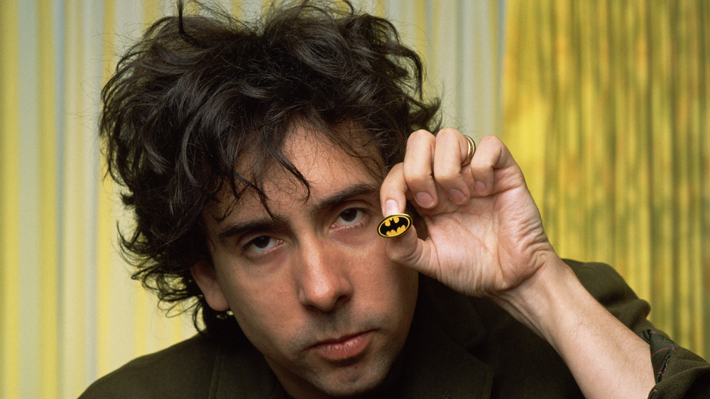 Tim Burton holding pin