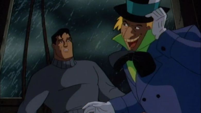 The Mad Hatter and Bruce Wayne on a clocktower