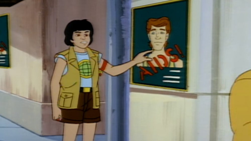 Ma-Ti and a poster of Todd Andrews in "Captain Planet and the Planeteers"