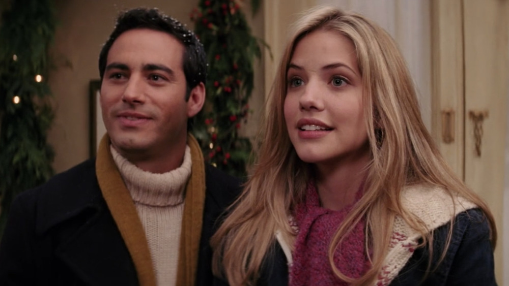 René Lavan as ﻿Enrique and Julie Gonzalo as ﻿Blair in Christmas with the Kranks