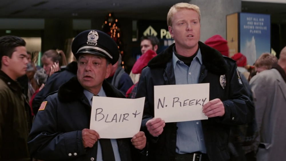 Police officers in Christmas with the Kranks