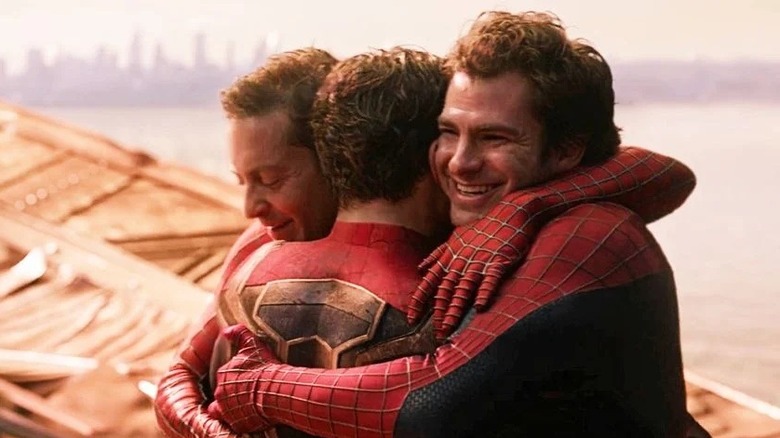 All three Spider-Men hugging