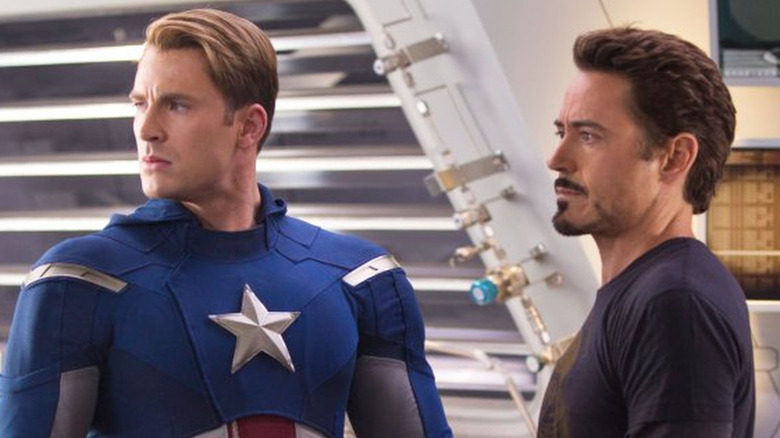 Captain America and Iron Man looking to the side