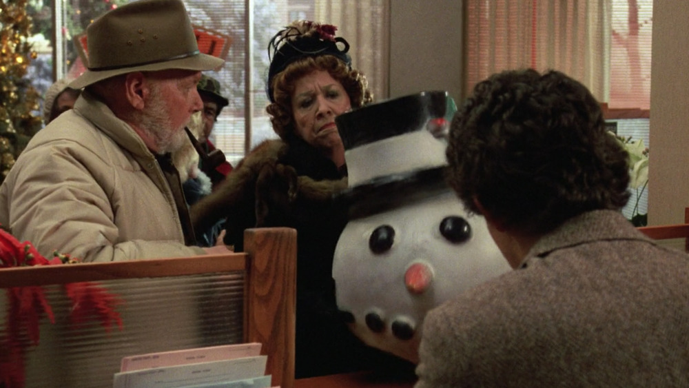 Polly Holliday as Mrs. Ruby Deagle in Gremlins